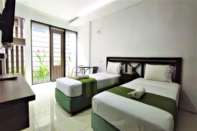 Imagen de la habitación del Hotel Klungkung Tower. Foto 19