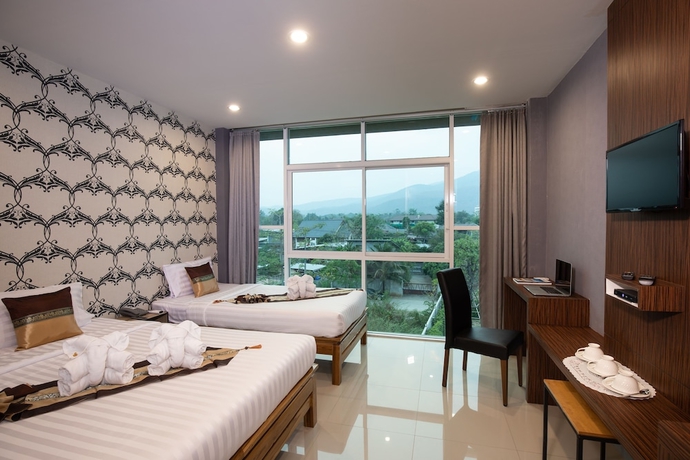 Imagen de la habitación del Hotel Km Chiangmai. Foto 2