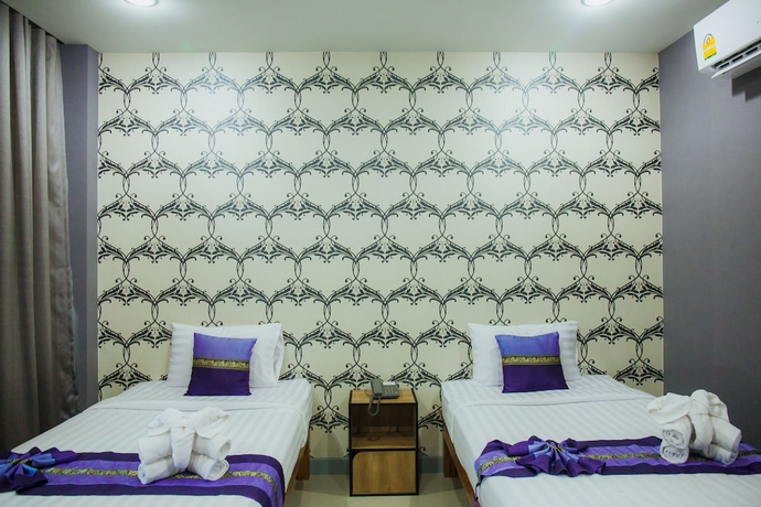 Imagen de la habitación del Hotel Km Chiangmai. Foto 12