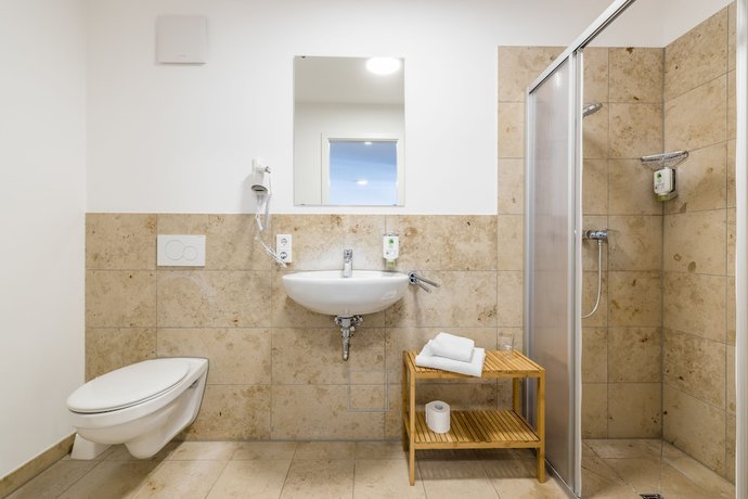 Imagen de la habitación del Hotel Kneitinger Alter Schlachthof. Foto 17