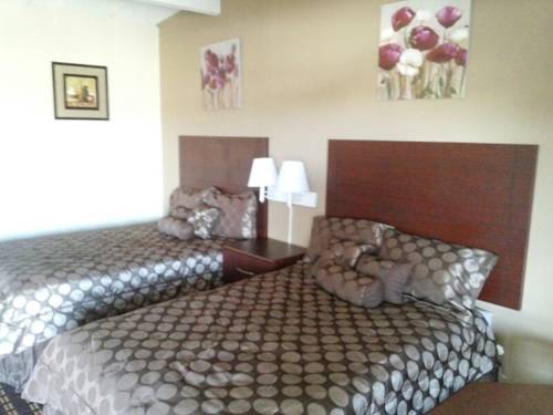 Imagen de la habitación del Hotel Knights Inn Fayetteville. Foto 13