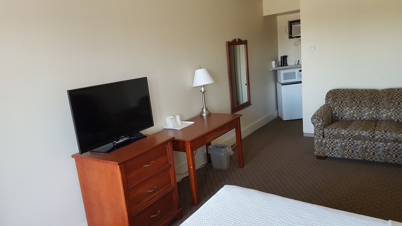Imagen de la habitación del Hotel Knights Inn Lethbridge. Foto 11