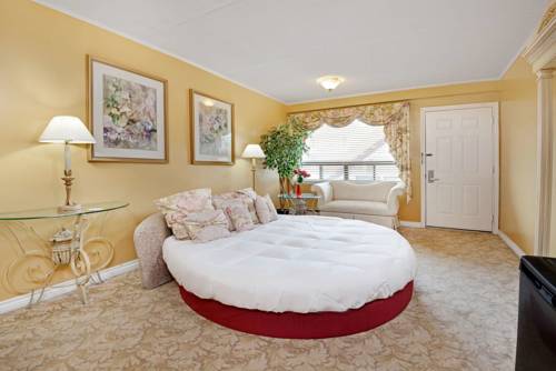 Imagen de la habitación del Hotel Knights Inn Midland, On. Foto 7