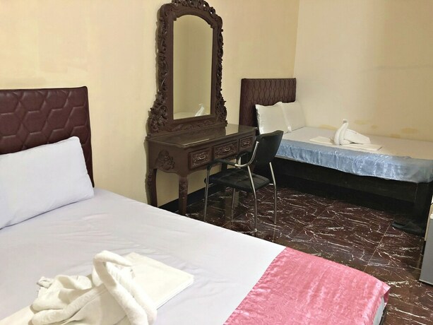 Imagen de la habitación del Hotel Knights Ko Suites. Foto 26
