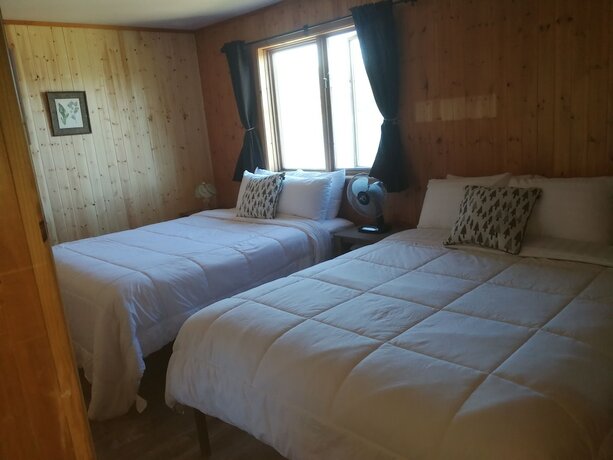 Imagen general del Hotel Knotty Pine Cottages. Foto 1