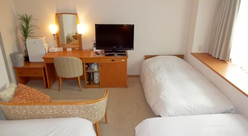 Imagen de la habitación del Hotel Kobe Luminous. Foto 7