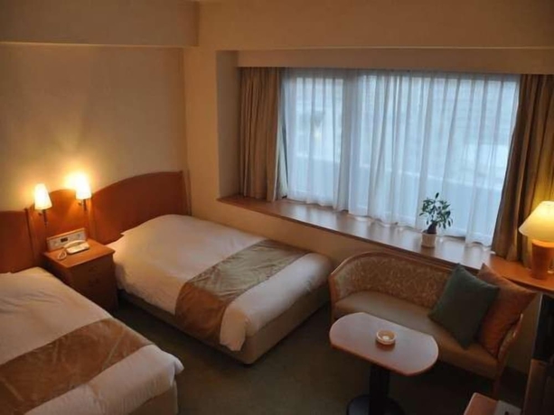 Imagen de la habitación del Hotel Kobe Luminous. Foto 8