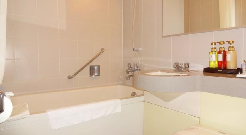 Imagen de la habitación del Hotel Kobe Luminous. Foto 15