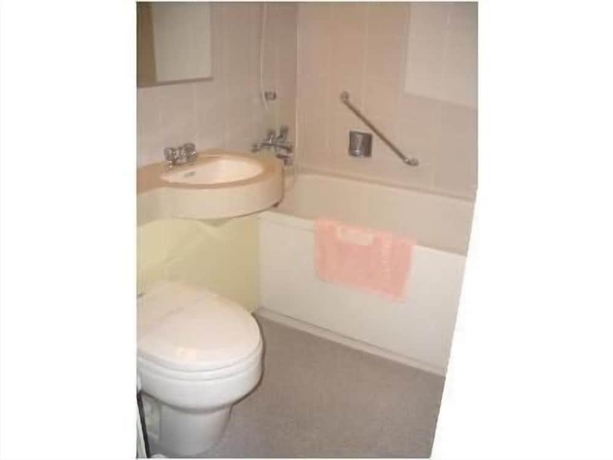 Imagen de la habitación del Hotel Kobe Luminous. Foto 16