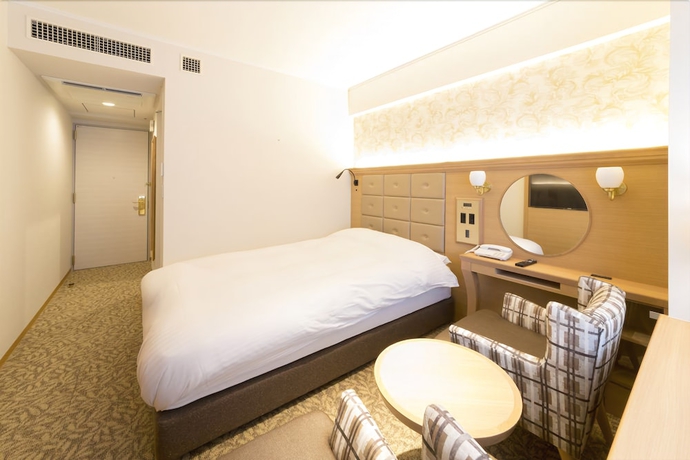 Imagen de la habitación del Hotel Kobe Luminous Sannomiya. Foto 11