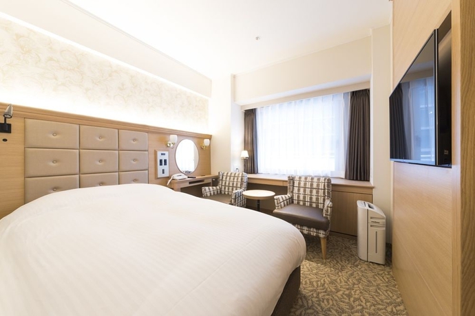 Imagen de la habitación del Hotel Kobe Luminous Sannomiya. Foto 12