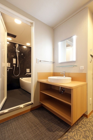 Imagen de la habitación del Hotel Kobe Luminous Sannomiya. Foto 15