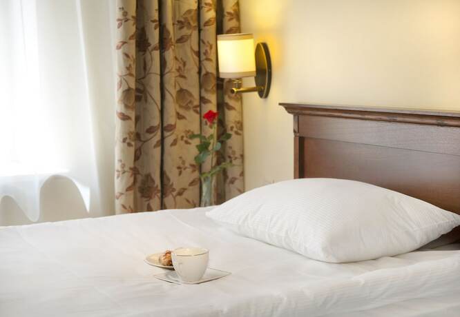 Imagen de la habitación del Hotel Kobza Haus Old Town. Foto 17