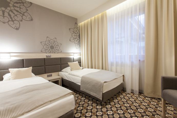 Imagen de la habitación del Hotel Kocierz Resort. Foto 13