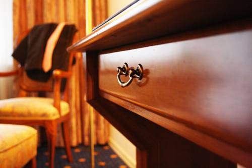 Imagen de la habitación del Hotel Koenig Stuben. Foto 15