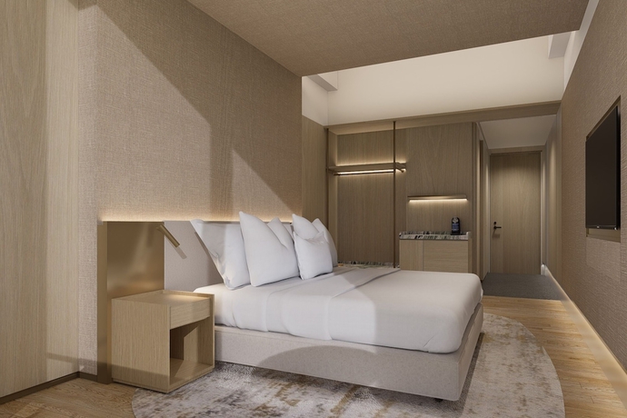 Imagen de la habitación del Hotel Koenokoeni Semarang. Foto 3