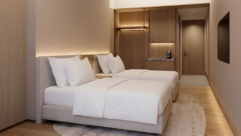 Imagen de la habitación del Hotel Koenokoeni Semarang. Foto 4