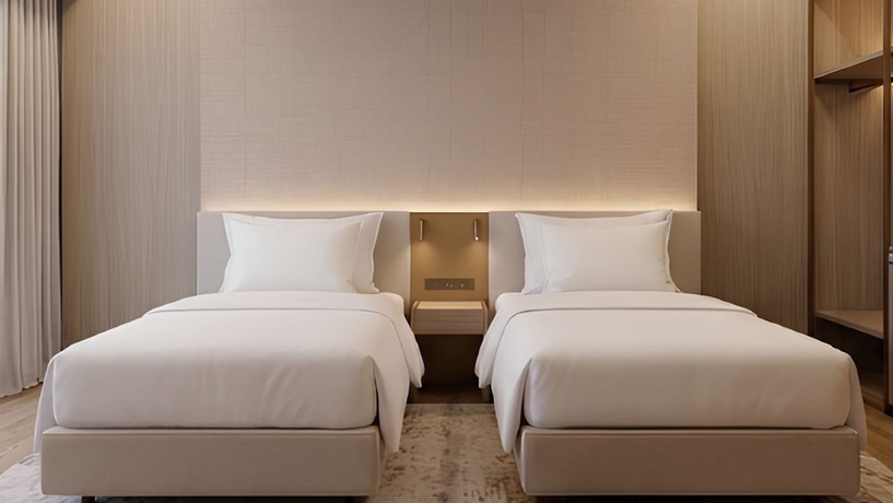 Imagen de la habitación del Hotel Koenokoeni Semarang. Foto 5