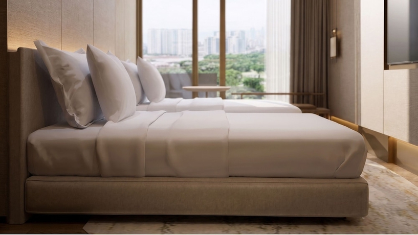 Imagen de la habitación del Hotel Koenokoeni Semarang. Foto 7