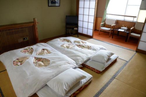 Imagen de la habitación del Hotel Kogakuro. Foto 7