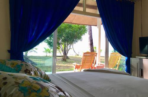 Imagen de la habitación del Hotel Koh Mook Riviera Beach Resort. Foto 11