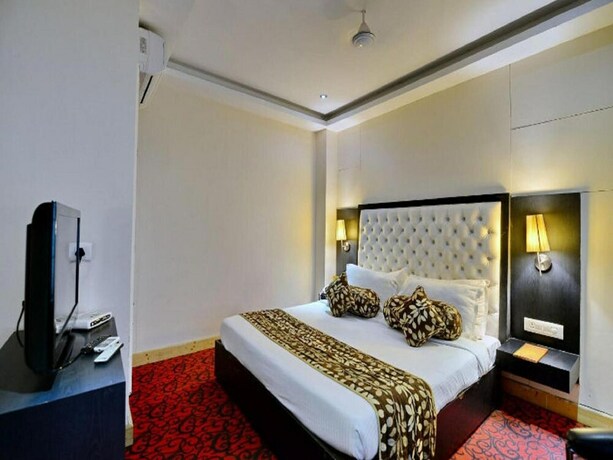 Imagen de la habitación del Hotel Kohinoor Palace, Ludhiana. Foto 13