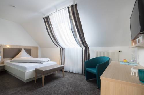 Imagen de la habitación del Hotel Kohlers Hotel Engel. Foto 5