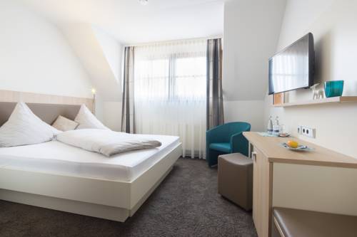 Imagen de la habitación del Hotel Kohlers Hotel Engel. Foto 7