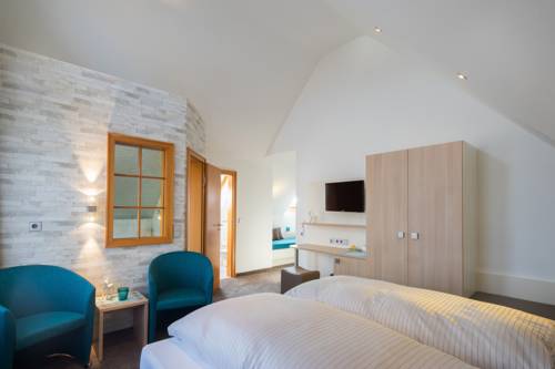 Imagen de la habitación del Hotel Kohlers Hotel Engel. Foto 9