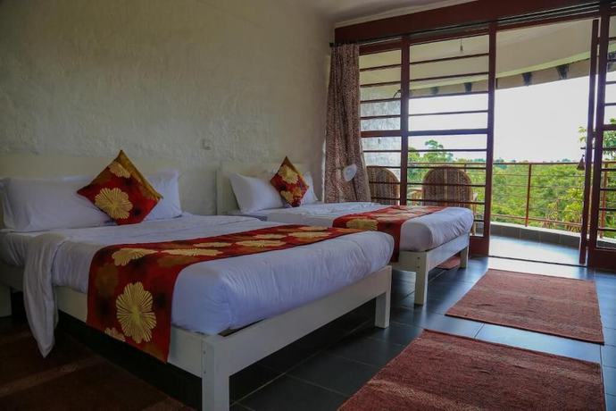 Imagen de la habitación del Hotel Koi Koi Cultural Village. Foto 11