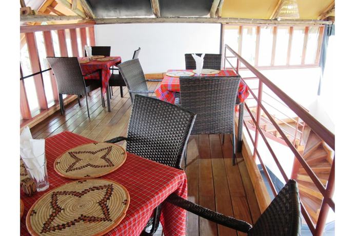 Imagen del bar/restaurante del Hotel Koi Koi Cultural Village. Foto 6
