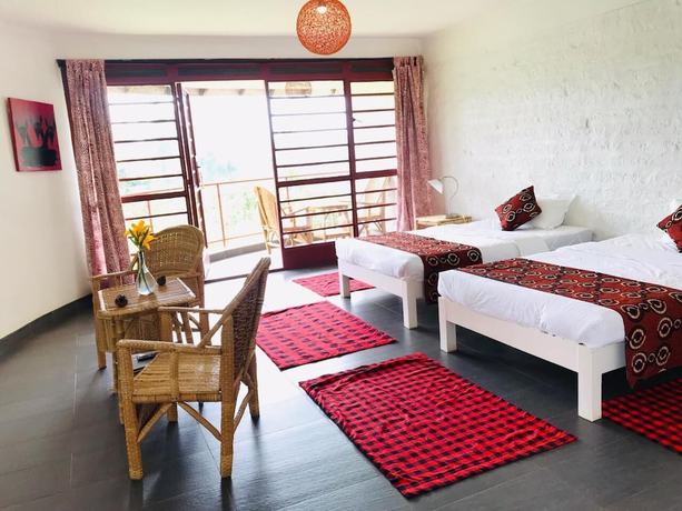 Imagen de la habitación del Hotel Koi Koi Cultural Village. Foto 14