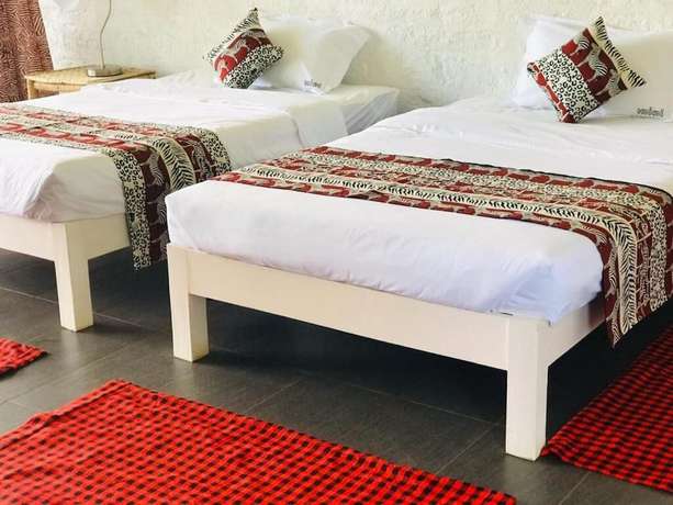 Imagen de la habitación del Hotel Koi Koi Cultural Village. Foto 15