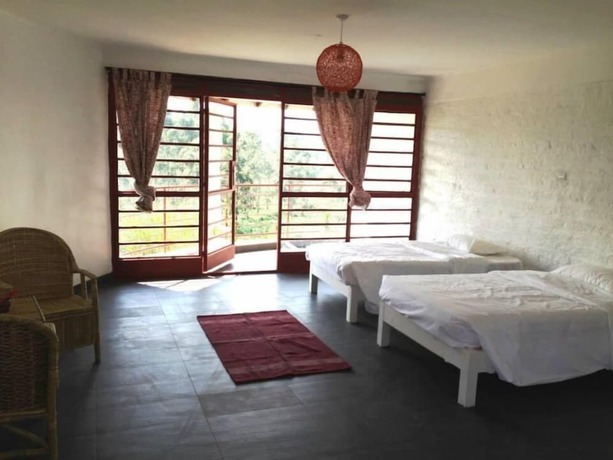 Imagen de la habitación del Hotel Koi Koi Cultural Village. Foto 16