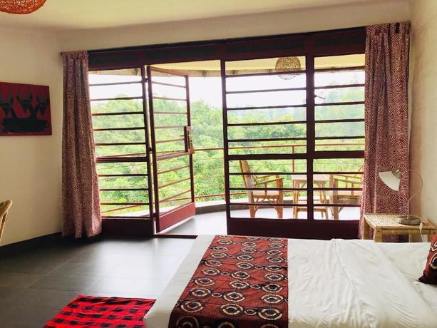Imagen de la habitación del Hotel Koi Koi Cultural Village. Foto 17