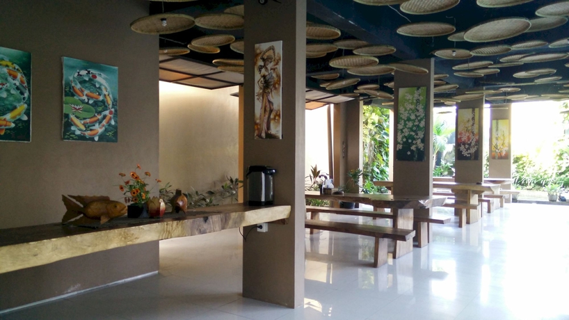 Imagen del bar/restaurante del Hotel Koi and Residence. Foto 2