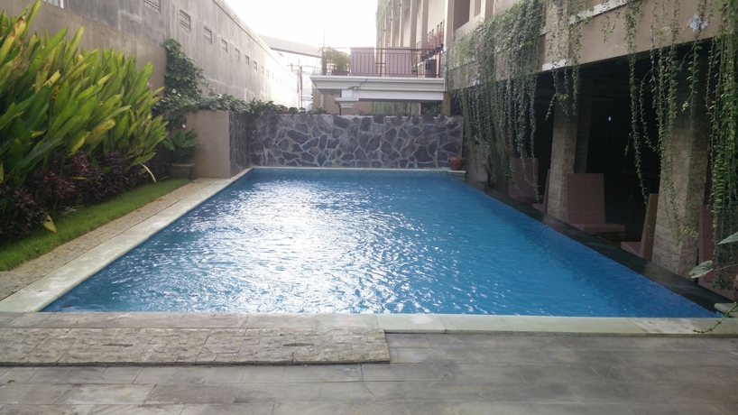 Imagen de la piscina del Hotel Koi and Residence. Foto 15