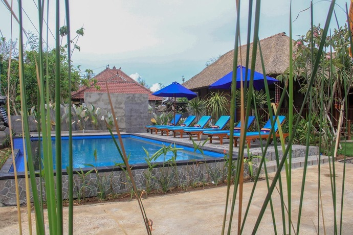 Imagen de la piscina del Hotel Koji Garden Huts. Foto 11