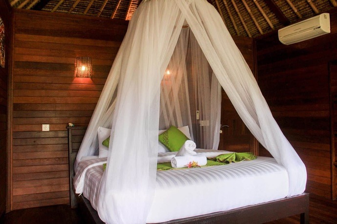 Imagen de la habitación del Hotel Koji Garden Huts. Foto 9