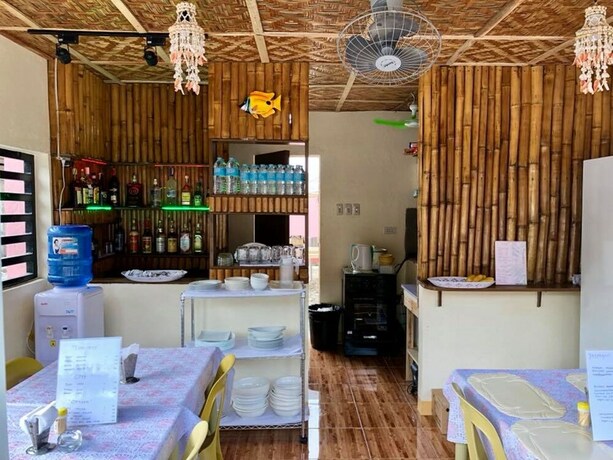 Imagen del bar/restaurante del Hotel Kojie House. Foto 4