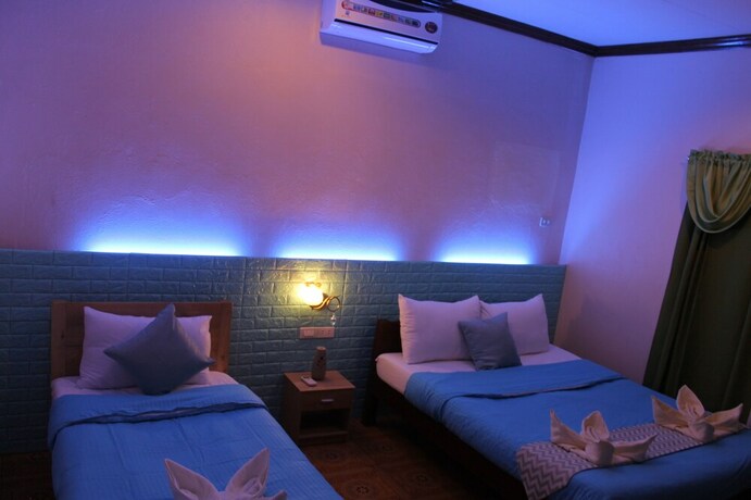 Imagen de la habitación del Hotel Kojie House. Foto 12