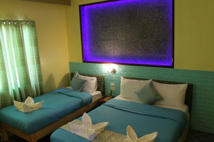 Imagen de la habitación del Hotel Kojie House. Foto 18