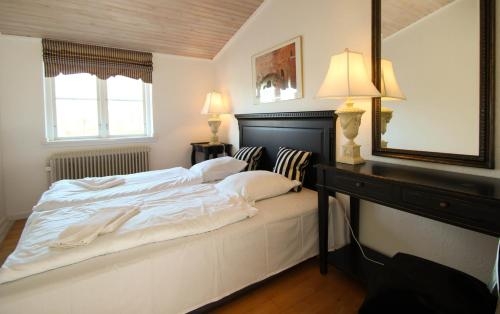 Imagen de la habitación del Hotel Kokkedal Slotshotel. Foto 10