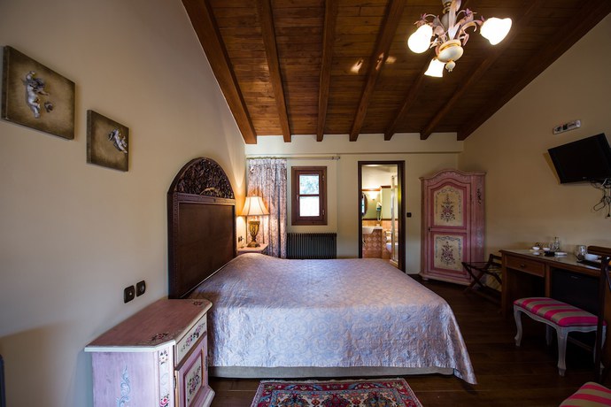 Imagen de la habitación del Hotel Kokkino Spiti Boutique. Foto 4