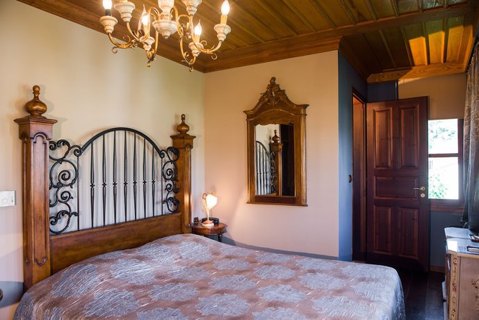 Imagen de la habitación del Hotel Kokkino Spiti Boutique. Foto 13