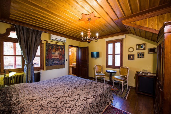 Imagen de la habitación del Hotel Kokkino Spiti Boutique. Foto 16
