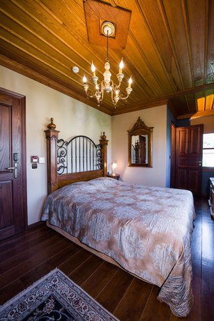 Imagen de la habitación del Hotel Kokkino Spiti Boutique. Foto 17