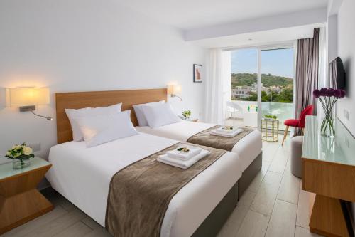 Imagen de la habitación del Hotel Kokkinos Boutique. Foto 4