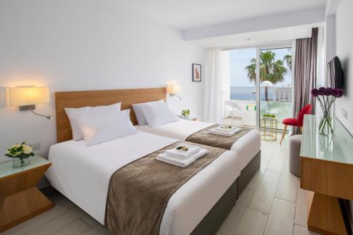 Imagen de la habitación del Hotel Kokkinos Boutique. Foto 6