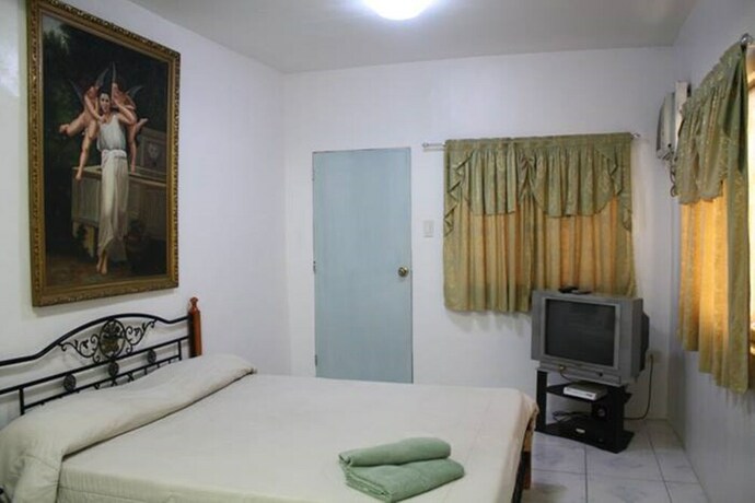 Imagen de la habitación del Hotel Kokomos Beach Resort. Foto 5